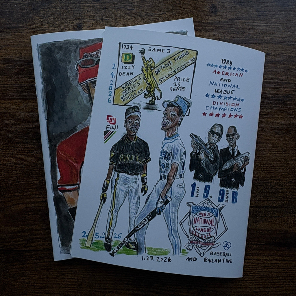 Illustrated posters on a wooden surface