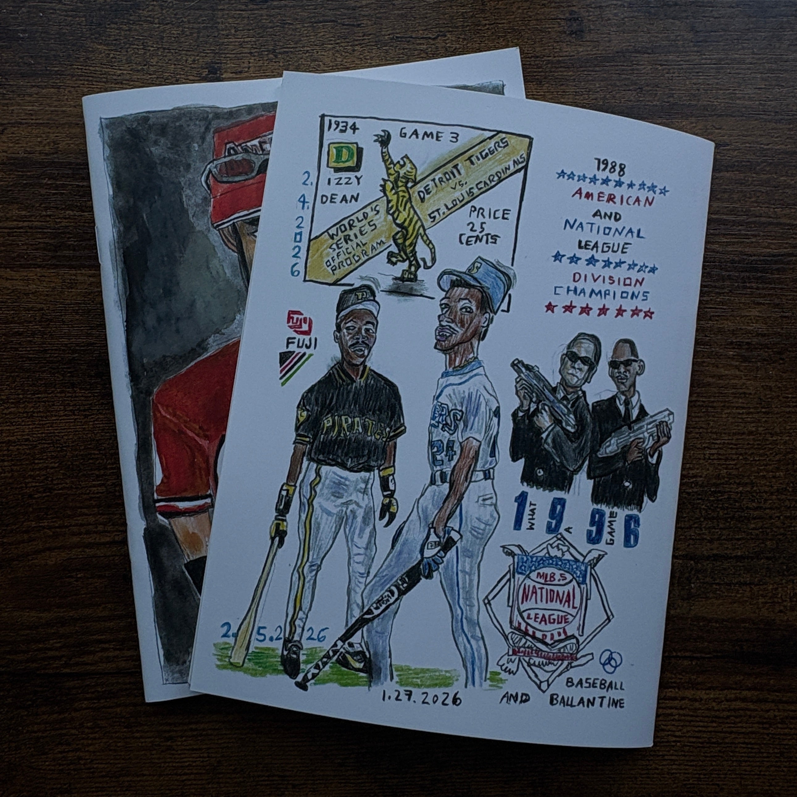 Illustrated posters on a wooden surface