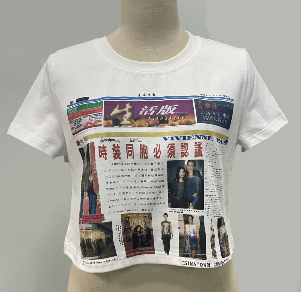 White t-shirt with newspaper print on a mannequin against a gray background